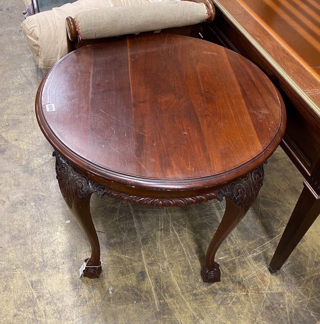 An early 20th century Chippendale revival circular mahogany centre table, diameter 73cm, height 70cm